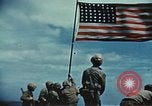 Image of famous American flag raising Mount Suribachi Iwo Jima, 1945, second 25 stock footage video 65675051573