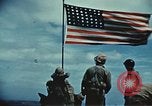 Image of famous American flag raising Mount Suribachi Iwo Jima, 1945, second 30 stock footage video 65675051573