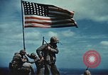 Image of famous American flag raising Mount Suribachi Iwo Jima, 1945, second 31 stock footage video 65675051573