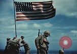 Image of famous American flag raising Mount Suribachi Iwo Jima, 1945, second 32 stock footage video 65675051573