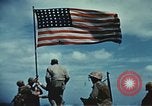 Image of famous American flag raising Mount Suribachi Iwo Jima, 1945, second 38 stock footage video 65675051573