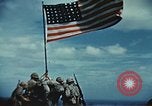 Image of famous American flag raising Mount Suribachi Iwo Jima, 1945, second 39 stock footage video 65675051573