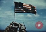 Image of famous American flag raising Mount Suribachi Iwo Jima, 1945, second 40 stock footage video 65675051573