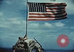 Image of famous American flag raising Mount Suribachi Iwo Jima, 1945, second 42 stock footage video 65675051573