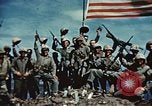 Image of famous American flag raising Mount Suribachi Iwo Jima, 1945, second 44 stock footage video 65675051573