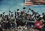 Image of famous American flag raising Mount Suribachi Iwo Jima, 1945, second 46 stock footage video 65675051573