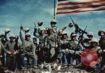 Image of famous American flag raising Mount Suribachi Iwo Jima, 1945, second 48 stock footage video 65675051573