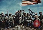 Image of famous American flag raising Mount Suribachi Iwo Jima, 1945, second 50 stock footage video 65675051573