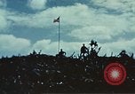 Image of famous American flag raising Mount Suribachi Iwo Jima, 1945, second 52 stock footage video 65675051573