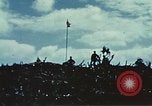 Image of famous American flag raising Mount Suribachi Iwo Jima, 1945, second 53 stock footage video 65675051573