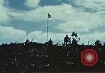 Image of famous American flag raising Mount Suribachi Iwo Jima, 1945, second 54 stock footage video 65675051573