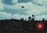 Image of famous American flag raising Mount Suribachi Iwo Jima, 1945, second 55 stock footage video 65675051573