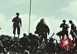 Image of famous American flag raising Mount Suribachi Iwo Jima, 1945, second 57 stock footage video 65675051573