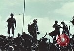Image of famous American flag raising Mount Suribachi Iwo Jima, 1945, second 58 stock footage video 65675051573