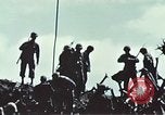 Image of famous American flag raising Mount Suribachi Iwo Jima, 1945, second 59 stock footage video 65675051573