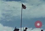 Image of famous American flag raising Mount Suribachi Iwo Jima, 1945, second 60 stock footage video 65675051573