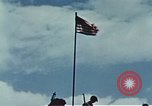 Image of famous American flag raising Mount Suribachi Iwo Jima, 1945, second 61 stock footage video 65675051573