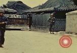 Standbild United States Marine Corps Okinawa Ryukyu Inseln, 1945, aus Sekunde 20 historischem Filmmaterial Videoclip 65675051654