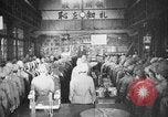 Standbild japanische Arbeiter in den Munitionsfabriken Japan, 1943, aus Sekunde 13 historischem Filmmaterial Videoclip 65675051698
