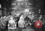 Standbild japanische Arbeiter in den Munitionsfabriken Japan, 1943, aus Sekunde 16 historischem Filmmaterial Videoclip 65675051698