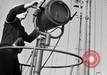 Image of LST communication using semaphore, signal flags, and blinking lights English Channel, 1944, second 8 stock footage video 65675051829