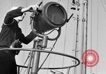 Image of LST communication using semaphore, signal flags, and blinking lights English Channel, 1944, second 9 stock footage video 65675051829