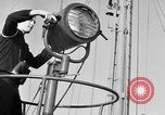 Image of LST communication using semaphore, signal flags, and blinking lights English Channel, 1944, second 14 stock footage video 65675051829