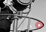 Image of LST communication using semaphore, signal flags, and blinking lights English Channel, 1944, second 15 stock footage video 65675051829