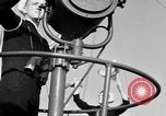 Image of LST communication using semaphore, signal flags, and blinking lights English Channel, 1944, second 16 stock footage video 65675051829