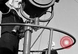 Image of LST communication using semaphore, signal flags, and blinking lights English Channel, 1944, second 17 stock footage video 65675051829