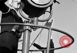 Image of LST communication using semaphore, signal flags, and blinking lights English Channel, 1944, second 18 stock footage video 65675051829