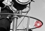 Image of LST communication using semaphore, signal flags, and blinking lights English Channel, 1944, second 20 stock footage video 65675051829