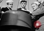Image of LST communication using semaphore, signal flags, and blinking lights English Channel, 1944, second 39 stock footage video 65675051829