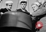 Image of LST communication using semaphore, signal flags, and blinking lights English Channel, 1944, second 40 stock footage video 65675051829