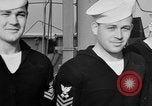 Image of LST communication using semaphore, signal flags, and blinking lights English Channel, 1944, second 48 stock footage video 65675051829