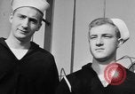 Image of LST communication using semaphore, signal flags, and blinking lights English Channel, 1944, second 50 stock footage video 65675051829
