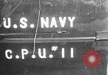 Image of U.S. sailors test fire hose on an LST Portland England United Kingdom, 1944, second 1 stock footage video 65675051842