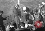 Image of U.S. sailors test fire hose on an LST Portland England United Kingdom, 1944, second 5 stock footage video 65675051842