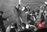 Image of U.S. sailors test fire hose on an LST Portland England United Kingdom, 1944, second 6 stock footage video 65675051842