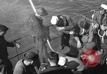 Image of U.S. sailors test fire hose on an LST Portland England United Kingdom, 1944, second 7 stock footage video 65675051842
