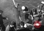 Image of U.S. sailors test fire hose on an LST Portland England United Kingdom, 1944, second 9 stock footage video 65675051842