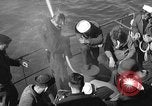 Image of U.S. sailors test fire hose on an LST Portland England United Kingdom, 1944, second 10 stock footage video 65675051842