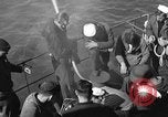Image of U.S. sailors test fire hose on an LST Portland England United Kingdom, 1944, second 11 stock footage video 65675051842