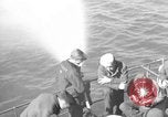Image of U.S. sailors test fire hose on an LST Portland England United Kingdom, 1944, second 12 stock footage video 65675051842