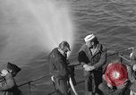 Image of U.S. sailors test fire hose on an LST Portland England United Kingdom, 1944, second 19 stock footage video 65675051842
