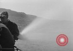 Image of U.S. sailors test fire hose on an LST Portland England United Kingdom, 1944, second 33 stock footage video 65675051842