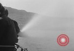 Image of U.S. sailors test fire hose on an LST Portland England United Kingdom, 1944, second 36 stock footage video 65675051842
