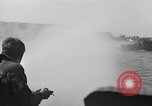 Image of U.S. sailors test fire hose on an LST Portland England United Kingdom, 1944, second 38 stock footage video 65675051842