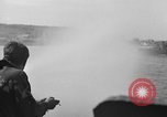 Image of U.S. sailors test fire hose on an LST Portland England United Kingdom, 1944, second 39 stock footage video 65675051842