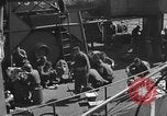 Image of U.S. sailors test fire hose on an LST Portland England United Kingdom, 1944, second 46 stock footage video 65675051842